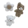 دمى صغيرة مع باقة من الزهور Item Picture